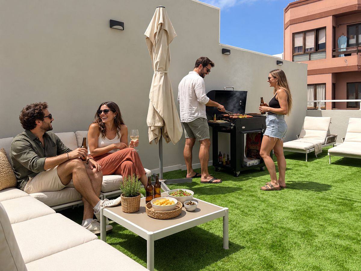 Friends having a barbecue on the rooftop of the house