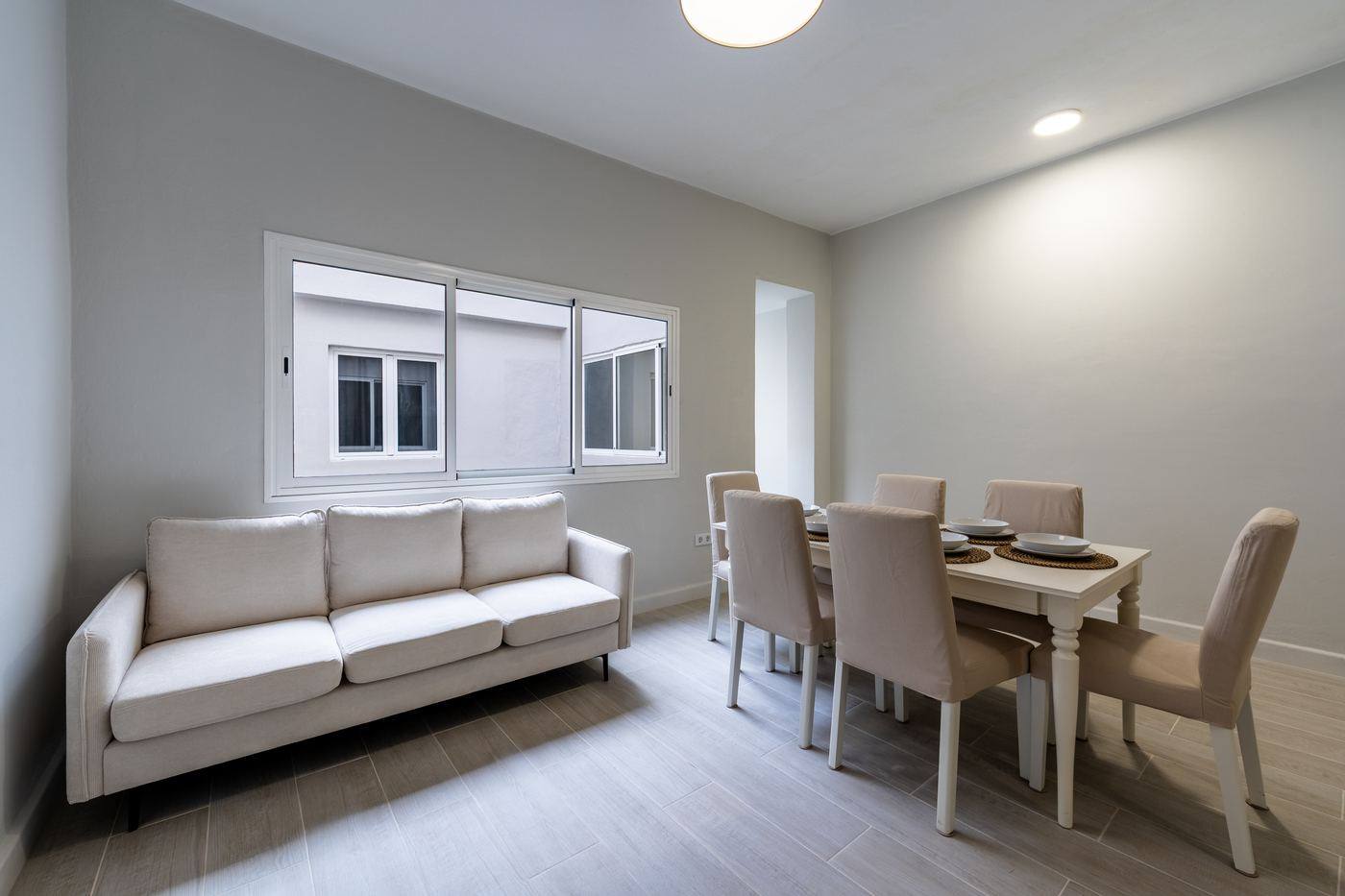 Living room with sofa and dining table